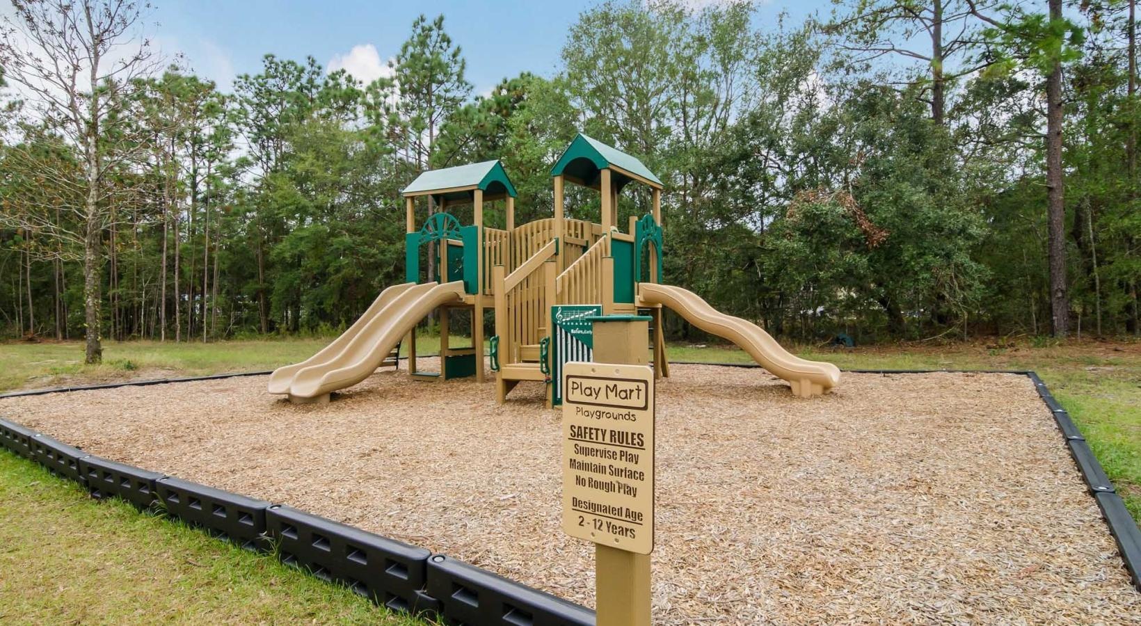 Settle into comfort at Cadia Myrtle Landing a playground with a slide