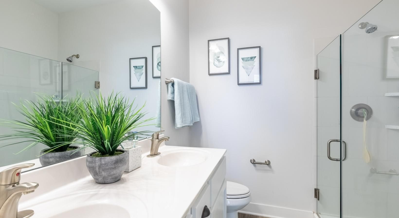 Spacious bathrooms with everything you need a bathroom with a sink toilet and a shower