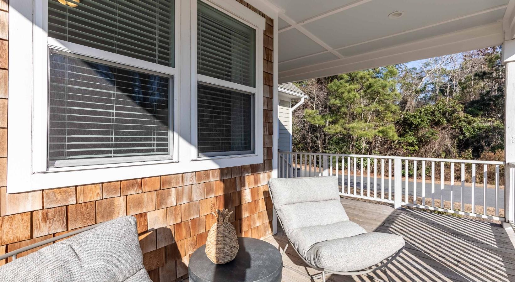 A perfect fit for the whole family a deck with chairs and a railing